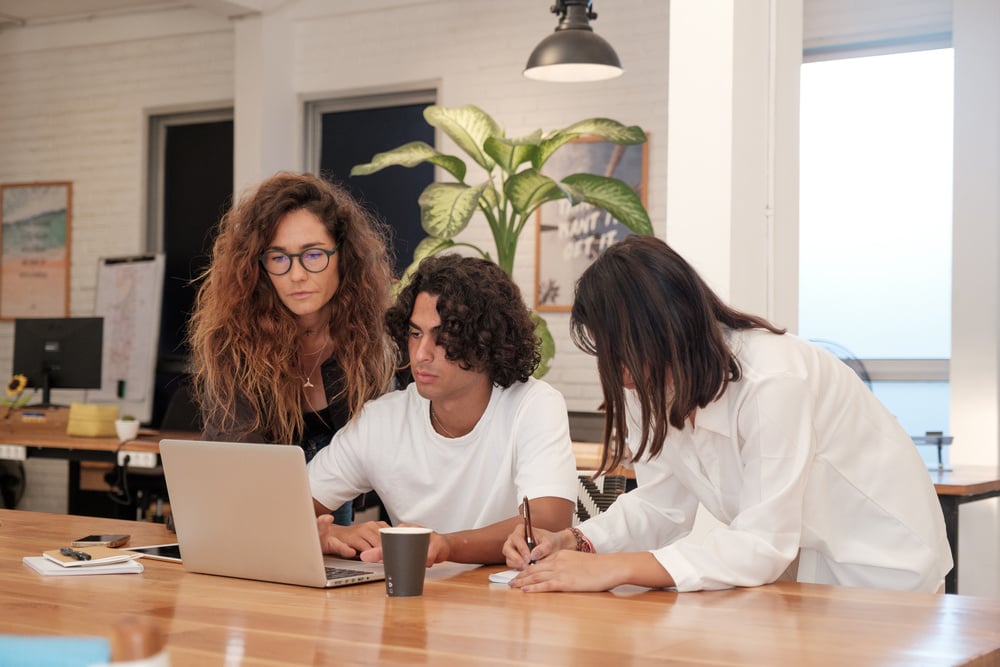 Colleagues Working Together in Office